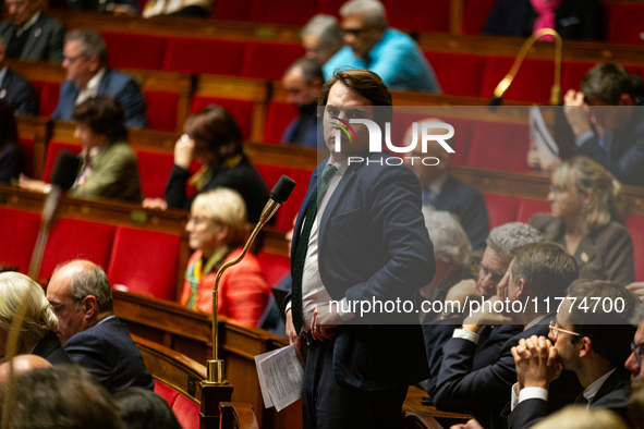 Bartolome Lenoir, deputy of the UDR group, prepares to speak during the session of questions to the French government at the National Assemb...