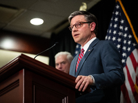 House Speaker Mike Johnson (R-LA) takes questions at a press conference with House Republican leaders following caucus elections on Capitol...