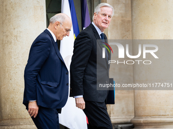 Didier Migaud, Keeper of the Seals and Minister of Justice, and Michel Barnier, French Prime Minister, are seen at the end of the council of...