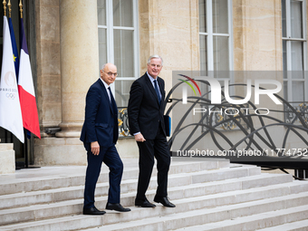 Didier Migaud, Keeper of the Seals and Minister of Justice, and Michel Barnier, French Prime Minister, are seen at the end of the council of...