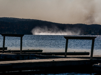 Army National Guard Blackhawk helicopters use water from Greenwood Lake to fight the Jennings Creek Wildfire in Greenwood Lake, NY, U.S., on...