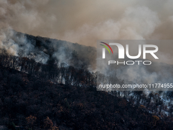 The Jennings Creek Wildfire burns near Greenwood Lake, NY, U.S., on November 13, 2024. The fire burns roughly 5000 acres with fire crews and...