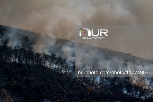 Army National Guard Blackhawk helicopters use water from Greenwood Lake to fight the Jennings Creek Wildfire in Greenwood Lake, NY, U.S., on...