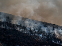 Army National Guard Blackhawk helicopters use water from Greenwood Lake to fight the Jennings Creek Wildfire in Greenwood Lake, NY, U.S., on...