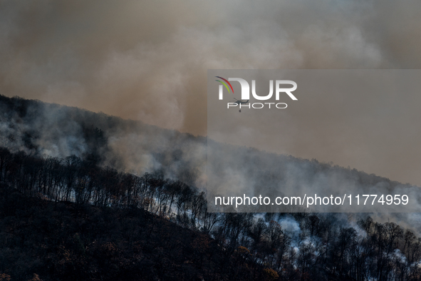 Army National Guard Blackhawk helicopters use water from Greenwood Lake to fight the Jennings Creek Wildfire in Greenwood Lake, NY, U.S., on...