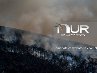 Army National Guard Blackhawk helicopters use water from Greenwood Lake to fight the Jennings Creek Wildfire in Greenwood Lake, NY, U.S., on...