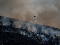 Army National Guard Blackhawk helicopters use water from Greenwood Lake to fight the Jennings Creek Wildfire in Greenwood Lake, NY, U.S., on...