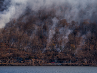 The Jennings Creek Wildfire burns near Greenwood Lake, NY, U.S., on November 13, 2024. The fire burns roughly 5000 acres with fire crews and...