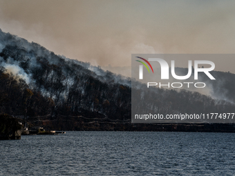 The Jennings Creek Wildfire burns near Greenwood Lake, NY, U.S., on November 13, 2024. The fire burns roughly 5000 acres with fire crews and...