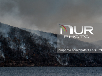 The Jennings Creek Wildfire burns near Greenwood Lake, NY, U.S., on November 13, 2024. The fire burns roughly 5000 acres with fire crews and...