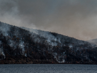 The Jennings Creek Wildfire burns near Greenwood Lake, NY, U.S., on November 13, 2024. The fire burns roughly 5000 acres with fire crews and...