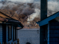 Army National Guard Blackhawk helicopters use water from Greenwood Lake to fight the Jennings Creek Wildfire in Greenwood Lake, NY, U.S., on...