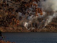 The Jennings Creek Wildfire burns near Greenwood Lake, NY, U.S., on November 13, 2024. The fire burns roughly 5000 acres with fire crews and...