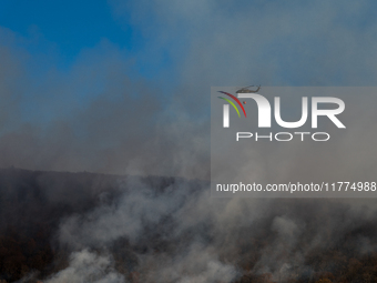 Army National Guard Blackhawk helicopters use water from Greenwood Lake to fight the Jennings Creek Wildfire in Greenwood Lake, NY, U.S., on...