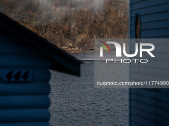 Army National Guard Blackhawk helicopters use water from Greenwood Lake to fight the Jennings Creek Wildfire in Greenwood Lake, NY, U.S., on...