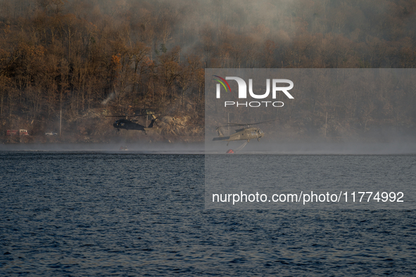 Army National Guard Blackhawk helicopters use water from Greenwood Lake to fight the Jennings Creek Wildfire in Greenwood Lake, NY, U.S., on...