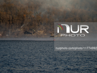 Army National Guard Blackhawk helicopters use water from Greenwood Lake to fight the Jennings Creek Wildfire in Greenwood Lake, NY, U.S., on...