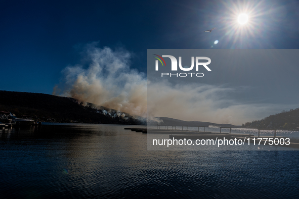 The Jennings Creek Wildfire burns near Greenwood Lake, NY, U.S., on November 13, 2024. The fire burns roughly 5000 acres with fire crews and...