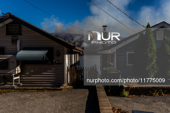 The Jennings Creek Wildfire burns near Greenwood Lake, NY, U.S., on November 13, 2024. The fire burns roughly 5000 acres with fire crews and...