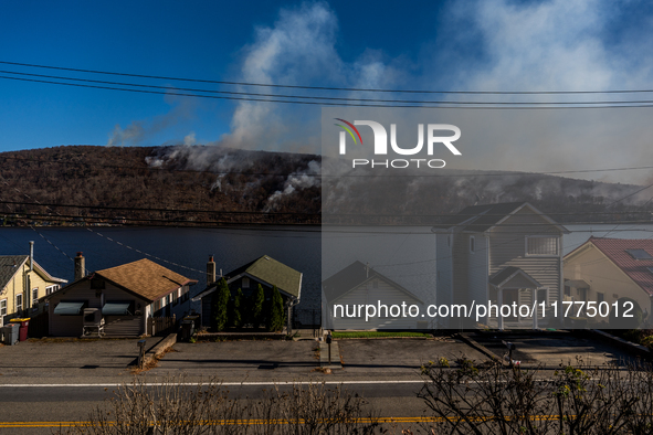 The Jennings Creek Wildfire burns near Greenwood Lake, NY, U.S., on November 13, 2024. The fire burns roughly 5000 acres with fire crews and...