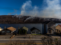 The Jennings Creek Wildfire burns near Greenwood Lake, NY, U.S., on November 13, 2024. The fire burns roughly 5000 acres with fire crews and...