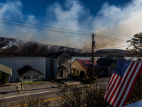 The Jennings Creek Wildfire burns near Greenwood Lake, NY, U.S., on November 13, 2024. The fire burns roughly 5000 acres with fire crews and...