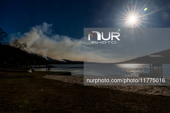 The Jennings Creek Wildfire burns near Greenwood Lake, NY, U.S., on November 13, 2024. The fire burns roughly 5000 acres with fire crews and...