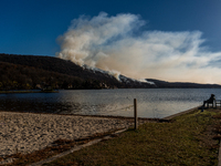 The Jennings Creek Wildfire burns near Greenwood Lake, NY, U.S., on November 13, 2024. The fire burns roughly 5000 acres with fire crews and...