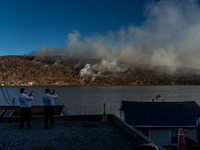 The Jennings Creek Wildfire burns near Greenwood Lake, NY, U.S., on November 13, 2024. The fire burns roughly 5000 acres with fire crews and...