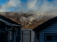 The Jennings Creek Wildfire burns near Greenwood Lake, NY, U.S., on November 13, 2024. The fire burns roughly 5000 acres with fire crews and...