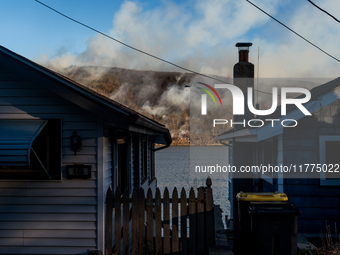 The Jennings Creek Wildfire burns near Greenwood Lake, NY, U.S., on November 13, 2024. The fire burns roughly 5000 acres with fire crews and...