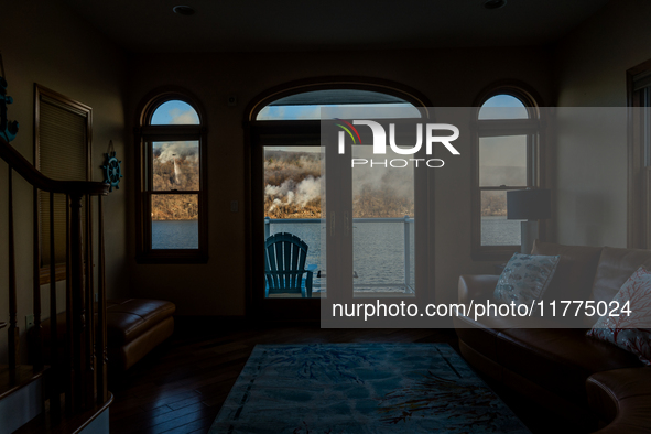 The Jennings Creek Wildfire is seen from a home in Greenwood Lake, NY, U.S., on November 13, 2024. The fire burns roughly 5000 acres with fi...