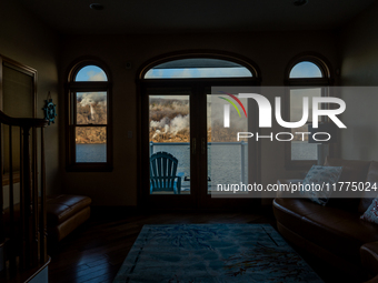 The Jennings Creek Wildfire is seen from a home in Greenwood Lake, NY, U.S., on November 13, 2024. The fire burns roughly 5000 acres with fi...