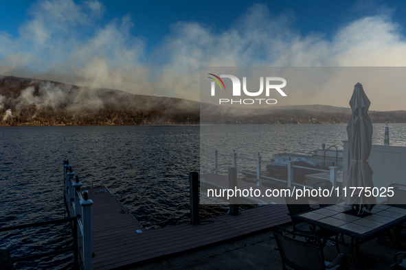 The Jennings Creek Wildfire is seen from a home in Greenwood Lake, NY, U.S., on November 13, 2024. The fire burns roughly 5000 acres with fi...