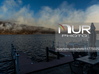 The Jennings Creek Wildfire is seen from a home in Greenwood Lake, NY, U.S., on November 13, 2024. The fire burns roughly 5000 acres with fi...