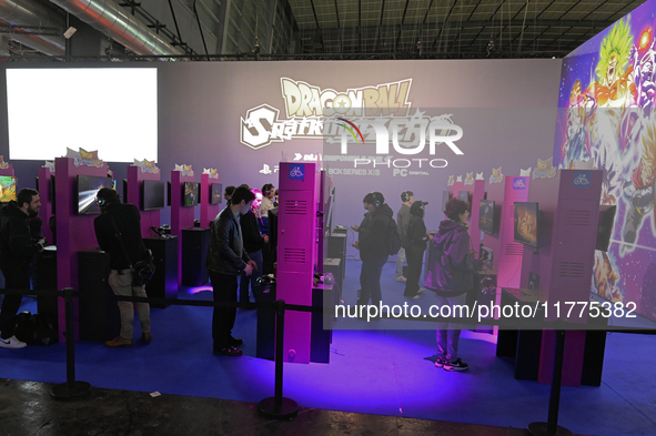 Visitors and gamers play the game ''Dragon Ball Sparking Zero'' at the Bandai Namco stand at the ''Paris Games Week'' video-game fair in Par...