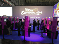 Visitors and gamers play the game ''Dragon Ball Sparking Zero'' at the Bandai Namco stand at the ''Paris Games Week'' video-game fair in Par...