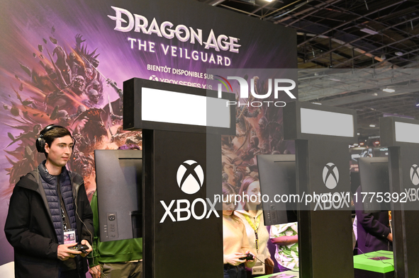 Visitors and gamers play the game ''Dragon Age The Veilguard'' at the ''Paris Games Week'' video-game fair in Paris, France, on October 22,...