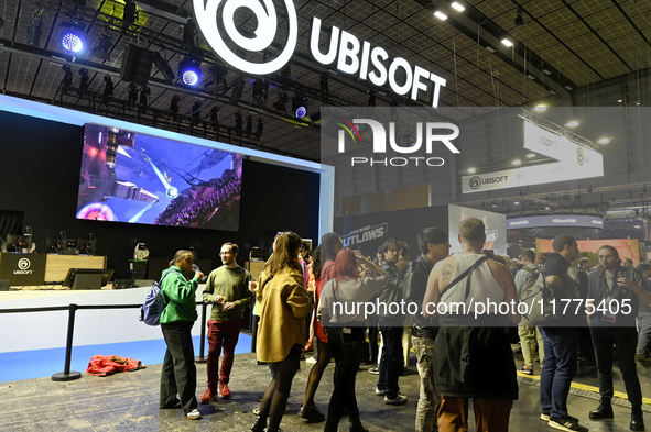 Visitors and gamers wait in front of the stand of the brand ''UBISOFT'' at the ''Paris Games Week'' video-game fair in Paris, France, on Oct...