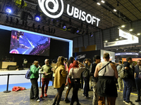 Visitors and gamers wait in front of the stand of the brand ''UBISOFT'' at the ''Paris Games Week'' video-game fair in Paris, France, on Oct...