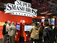 Visitors and gamers play the game ''Super Smash Bros'' at the Nintendo stand at the ''Paris Games Week'' video-game fair in Paris, France, o...