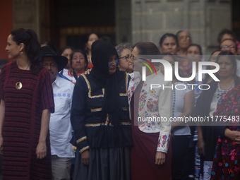 Claudia Sheinbaum (white jacket), President of Mexico, is at the National Palace in Mexico City, Mexico, during the announcement of the next...