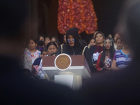 Indigenous women artisans accompany Claudia Sheinbaum (white jacket), President of Mexico, at the National Palace in Mexico City, Mexico, du...