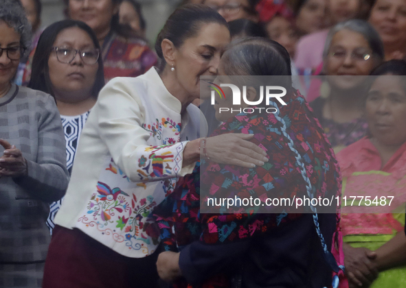 Claudia Sheinbaum (white jacket), President of Mexico, is at the National Palace in Mexico City, Mexico, during the announcement of the next...