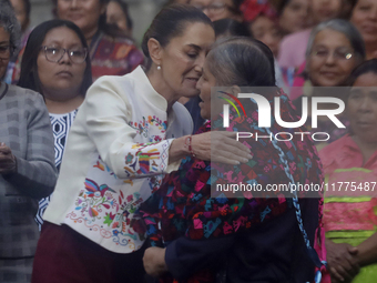 Claudia Sheinbaum (white jacket), President of Mexico, is at the National Palace in Mexico City, Mexico, during the announcement of the next...