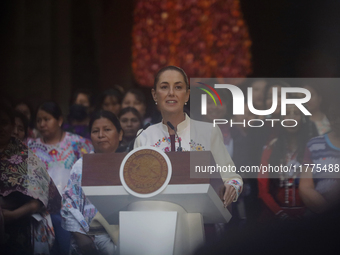 Claudia Sheinbaum (white jacket), President of Mexico, is at the National Palace in Mexico City, Mexico, during the announcement of the next...