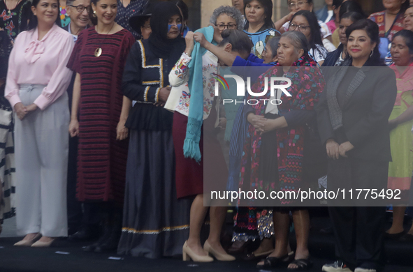 Claudia Sheinbaum (white jacket), President of Mexico, is at the National Palace in Mexico City, Mexico, during the announcement of the next...