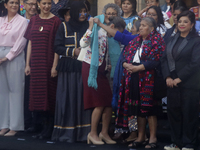 Claudia Sheinbaum (white jacket), President of Mexico, is at the National Palace in Mexico City, Mexico, during the announcement of the next...