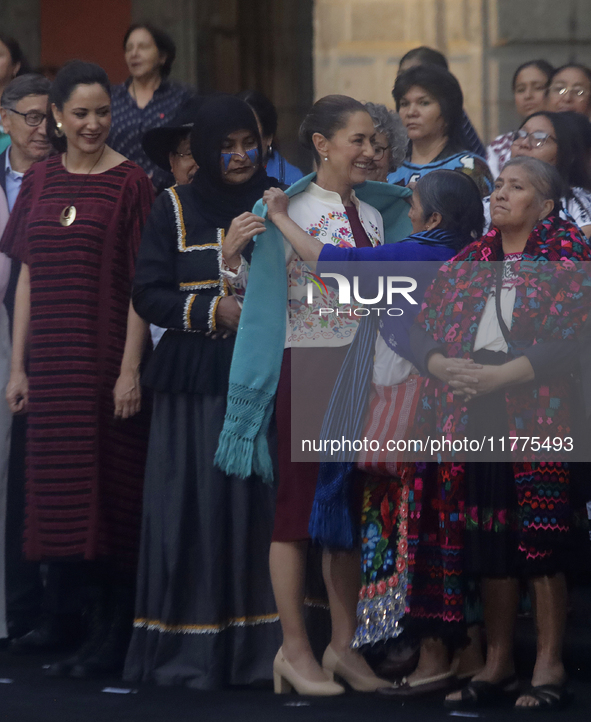 Claudia Sheinbaum (white jacket), President of Mexico, is at the National Palace in Mexico City, Mexico, during the announcement of the next...