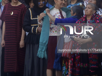 Claudia Sheinbaum (white jacket), President of Mexico, is at the National Palace in Mexico City, Mexico, during the announcement of the next...